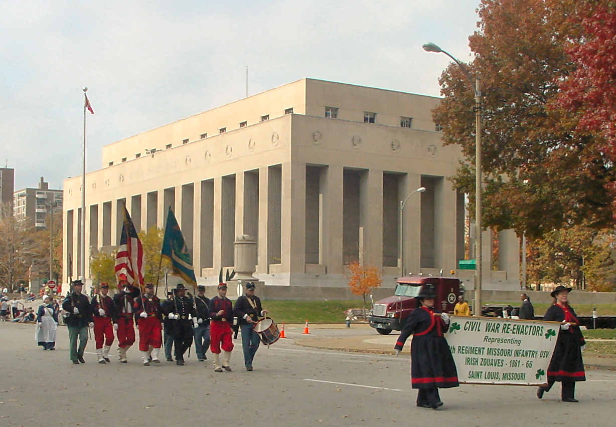 Women carrying banner in parade